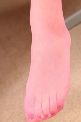 21P Big boobed secretary Harper posing in pink pantyhose on the office table