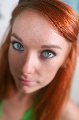 15P Petite redhead strips naked before sporting a mouthful of cum after a blowjob