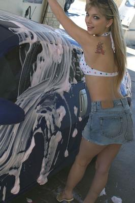 12P Blonde amateur Jana Jordan shows off her pink bikini bottoms at the car wash