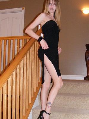 20P Long legged amateur Kiss Alissa doffs a long black dress before masturbating