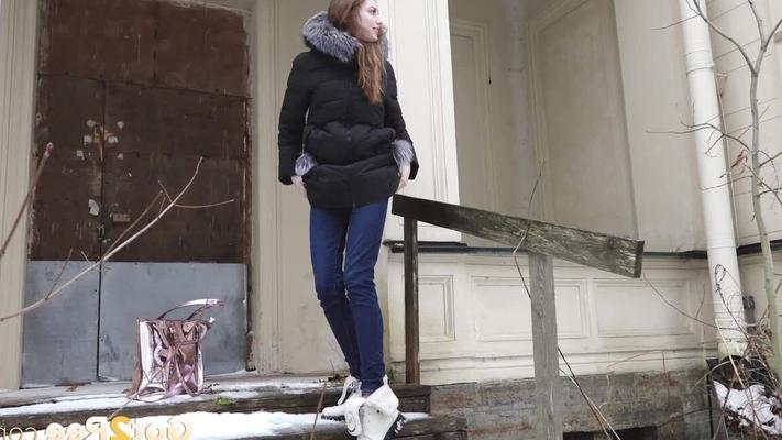 15P Distressed girl pulls down her jeans to pee on snow-covered steps