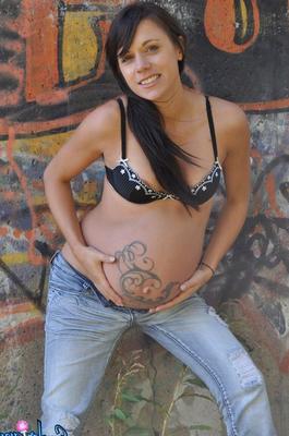 16P Pregnant solo girl Brianna shows her small tits and belly bump in faded jeans
