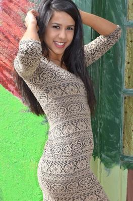 12P Dark haired Latina girl Bella Quinn models non nude in doorway wearing a dress