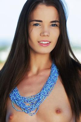 18P Beautiful teen Lovenia Lux confidently displays her naked body by a pool