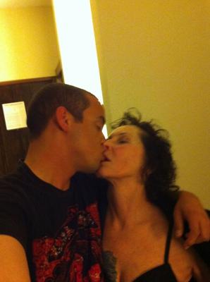 20P Curly haired mature woman likes sending her younger partner provocative photos