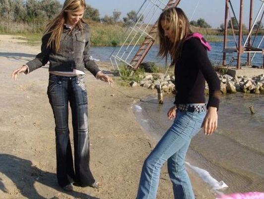 15P Young lesbians Katrina & Laura kiss outdoors before licking bare chests
