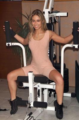 16P Teen amateur wears fingerless gloves while toying her twat on gym equipment