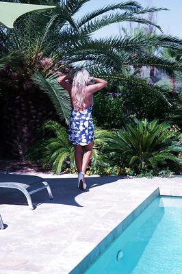 16P Large breasted housewife Sandra Otterson flashing outdoors in skirt