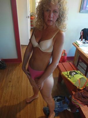 20P Old woman with curly blonde hair strips before sucking a cock and masturbating