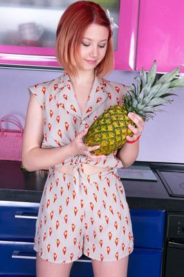 20P Cute teen Anais gets totally naked while eating a pineapple