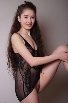 16P Teen model with long hair removes see thru lingerie for confident nude poses