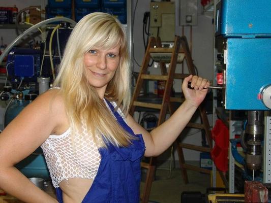 20P Mature blonde removes her overall before masturbating in workshop