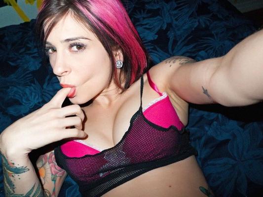 17P Horny MILF beauty Joanna Angel showing her shaved pussy & fingering her ass