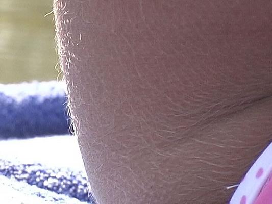 21P American MILF Lori Anderson showing off her hairy arms in a bikini