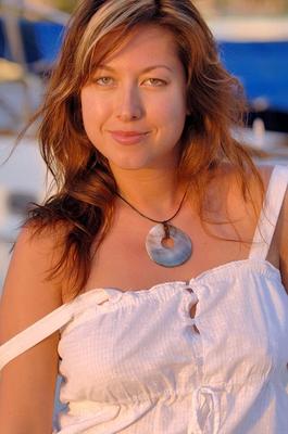 21P Naughty teen Andrea undresses to show her fine breasts in public