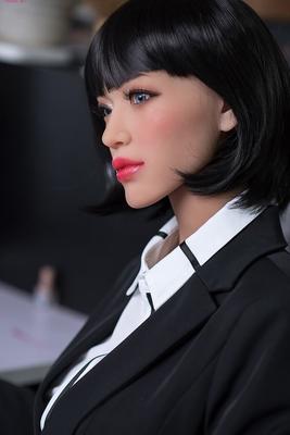 20P Secretary sex doll Bridgette shows her big ass, tits and bald pussy at work