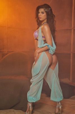 21P Stunning pornstar Gina Valentina flaunting her glorious ass in a hot strip
