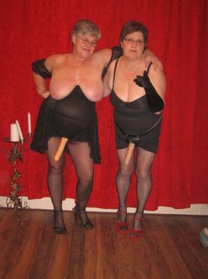 20P Big titted granny Girdle Goddess and her lesbian girlfriend don strapon cocks