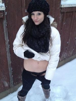 12P Amateur Freckles in yoga pants & boots teasing with big tits in the snow