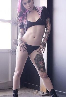 12P Babe with a perfect figure Joanna Angel shows her tattooed body and big tits
