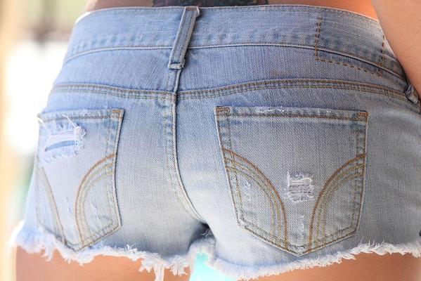 16P Young blonde girl uncovers her perky tits in jeans shorts and heels