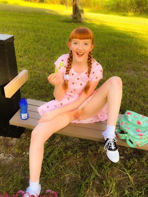 20P Redheaded teen Krystal Orchid shows her sweet boobs and ass outdoors