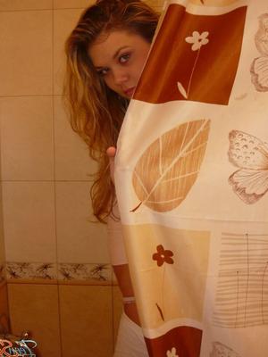 15P Young blonde girl sucks a large cock in bathroom after being caught peeing