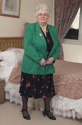 15P Older granny is still horny and plays with her fatty pussy on the bed