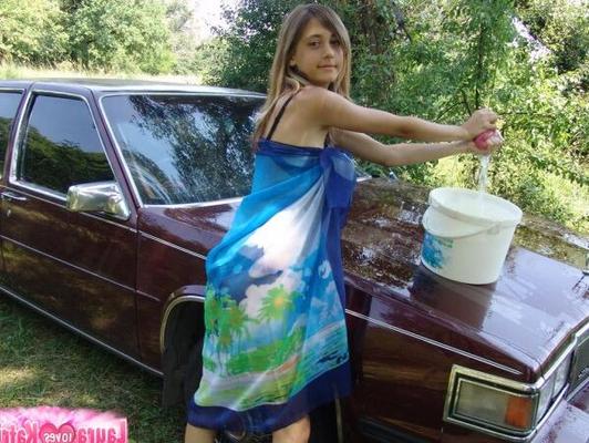 15P Wonderful amateur teen gets naked in the nature and spreads her yummy muff