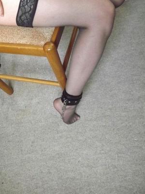 16P Petite girl sports hand and ankle cuffs while collared in lingerie