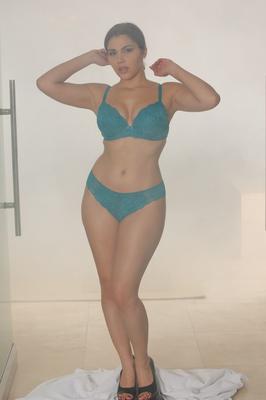 17P Steamy masseuse Valentina Nappi disrobes to show natural tits & curvy big ass