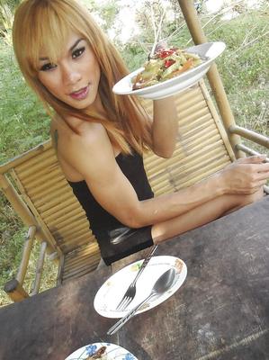 16P Skinny Asian ladyboy Mic shows off small boobs and hairy dick outdoors