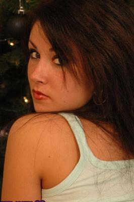 12P Charming brunette covers her big boobs with hands after exposing her tight ass