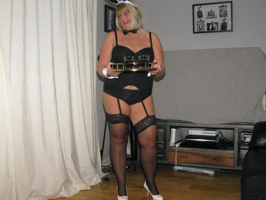 16P Thick blonde Chrissy Uk frees her tits & pussy from cocktail waitress attire