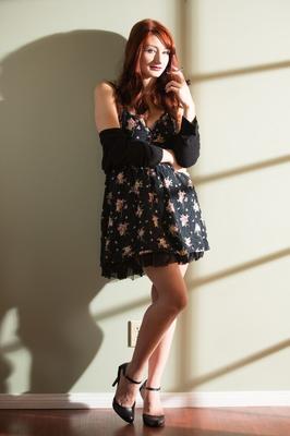 15P Smoking redhead model flashing tits and trimmed bush from underneath dress