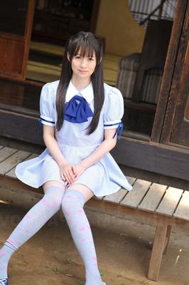 15P Japanese cutie Ai Uehara sits on the balcony and reveals her unshaved vagina