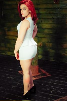 15P Redheaded submissive Kimber Woods gets banged by strapon lesbians in a dungeon