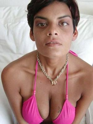21P Busty Latina Thalia sucks a large dick and has rough protected sex
