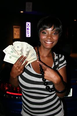 17P Hot African American female Stacy Adams flashes the cash and a big tit too
