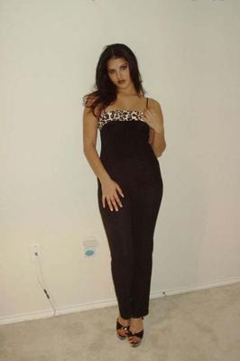 10P Solo model Sunny Leone strips off pantsuit to model nude in heels