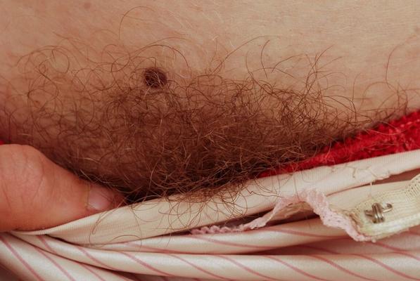 16P Gorgeous ginger Valcorie squats to show her hairy red pussy close up