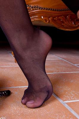 16 Pics Foot fetish scene features lesbian girl with long legs in stockings Alexa Tomas
