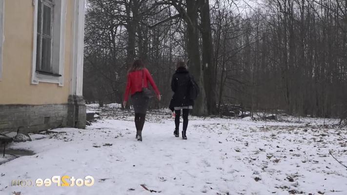 15P Katya and her girlfriend pee on the snow-covered steps of a building