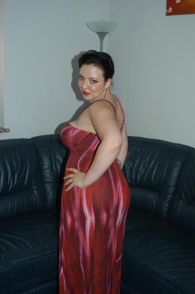 20P Filthy German MILF Pam hikes her red dress up and masturbates with a vibrator