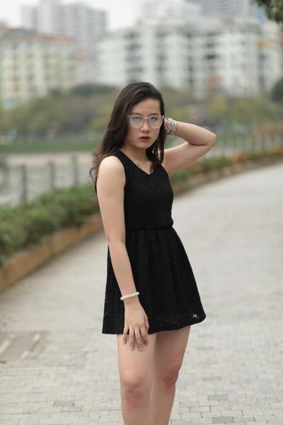 20P Barefoot Asian babe does a hot tease wearing a sexy black dress outdoors