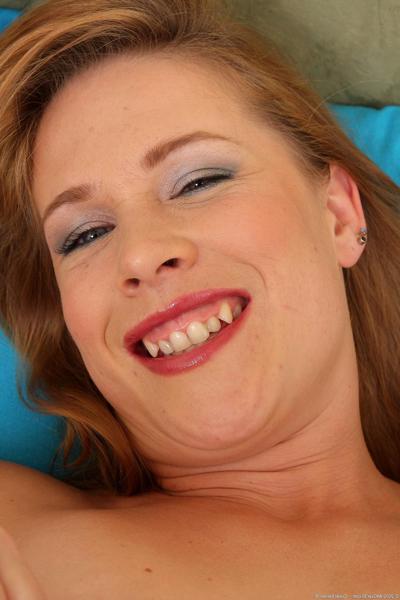 20P Naughty MILF Laura King undressing and fingering her holes on the sofa