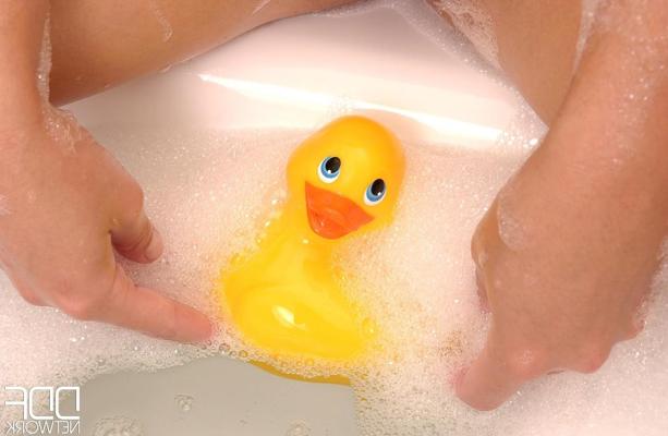 20P Sexy babe Sandra Shine toys with a rub-a-dub duck in the bathroom