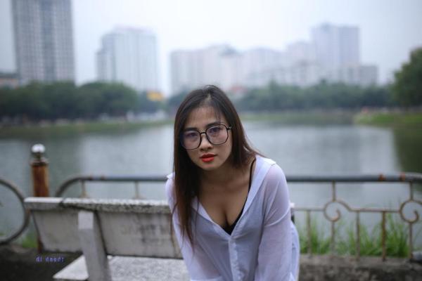 20P Pretty Asian babe Elena posing in her white shirt and pants outdoors