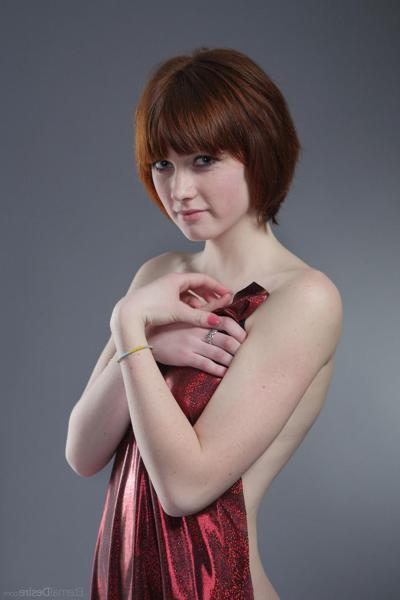 20P Sexy nude redheaded babe with a cute face Bretta A flaunts her natural tits 