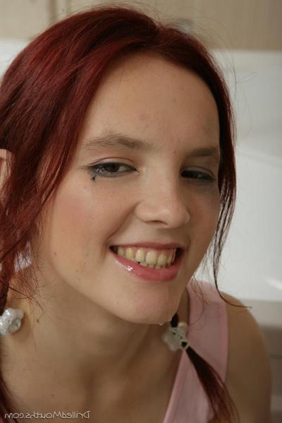 16P Young redhead Oksana sucks off a cock after after sex in the bathroom